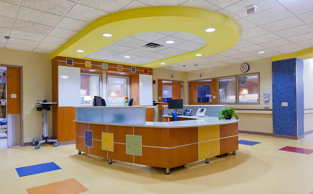 Children's hospital nurses station with colorful designs on floors, walls and ceiling