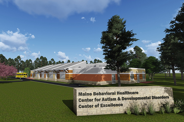 The Maine Behavioral Healthcare Center of Excellence in Autism and Developmental Disorders exterior and sign on sunny day