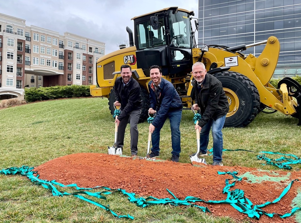 3 men with shovels for groundbreaking